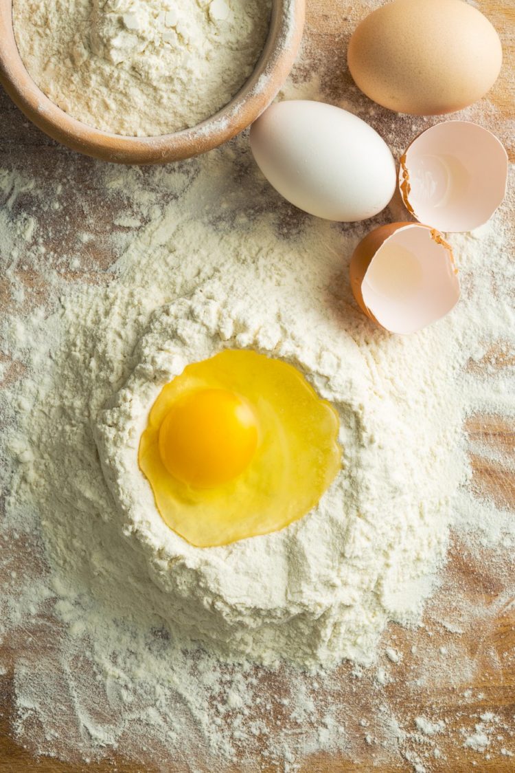 Raw egg in flour to make pasta