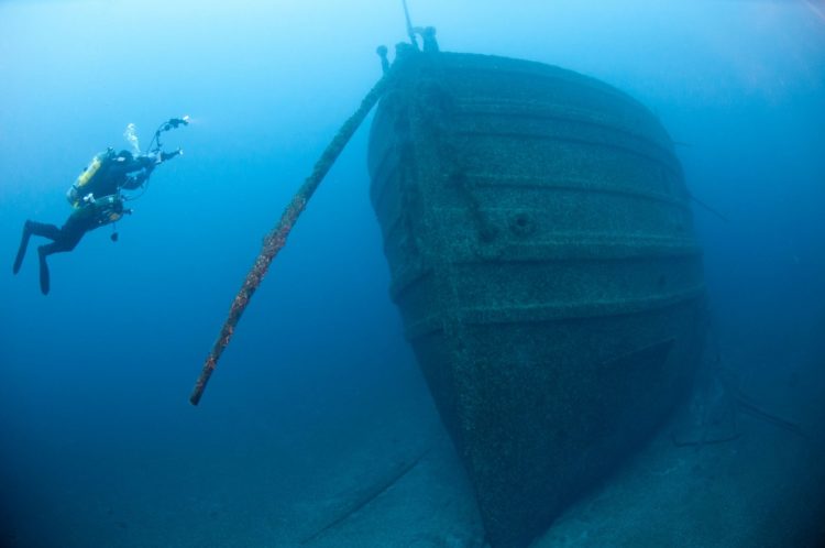 A diver explores a shipwreck at the Thunder Bay sanctuary (NOAA-NMS)