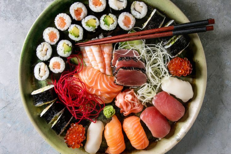 Large plate of sushi and rolls