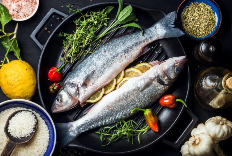 Preparing fish for dinner - Food in a frying pan