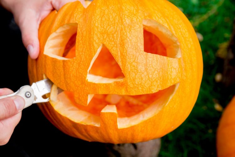 Carving a pumpkin for Halloween