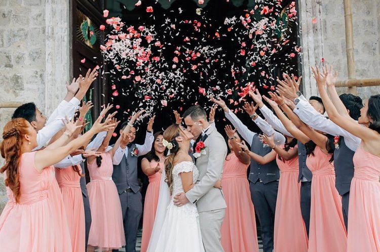 Wedding confetti and celebration with budget bridal gown