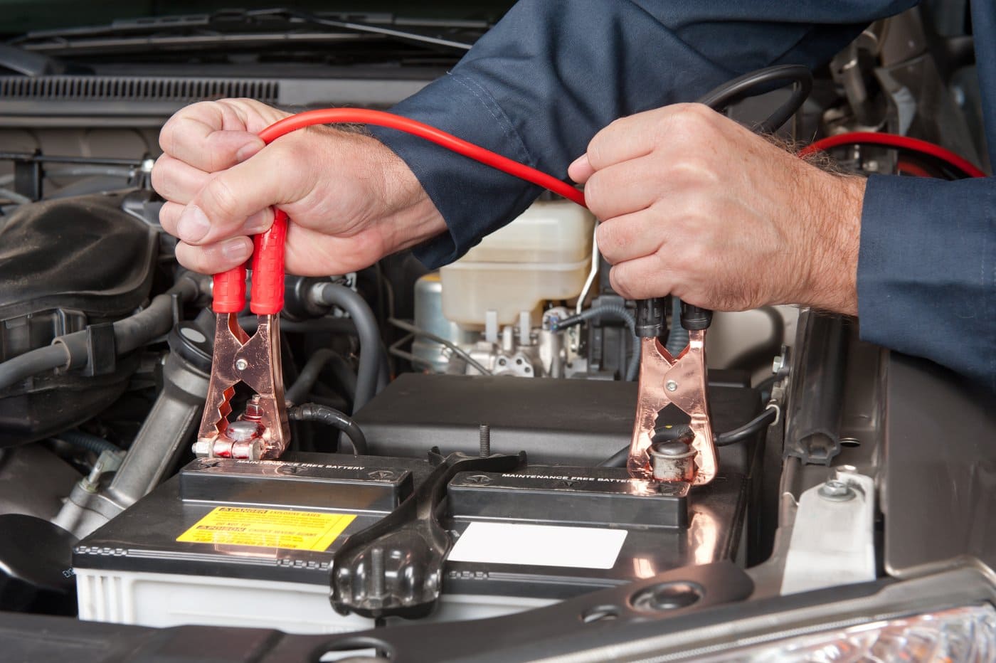 How do you connect jumper cables to jump start a car?