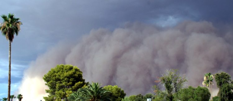 Arizona monsoon season dust storm blowing in