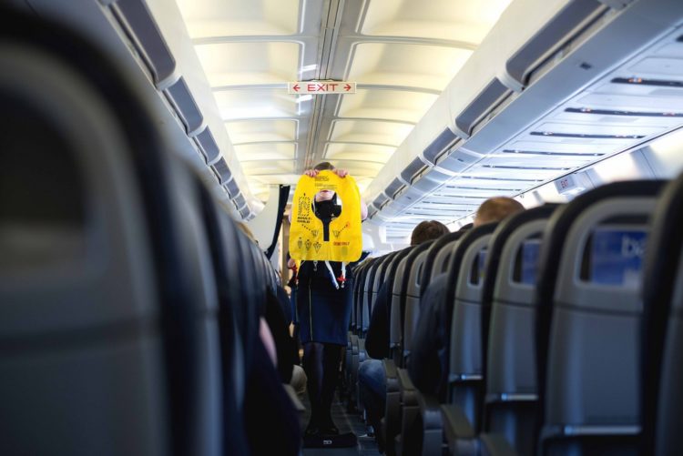 Airplane flight attendant safety demonstration