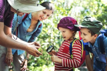 Family hiking and learning science nature