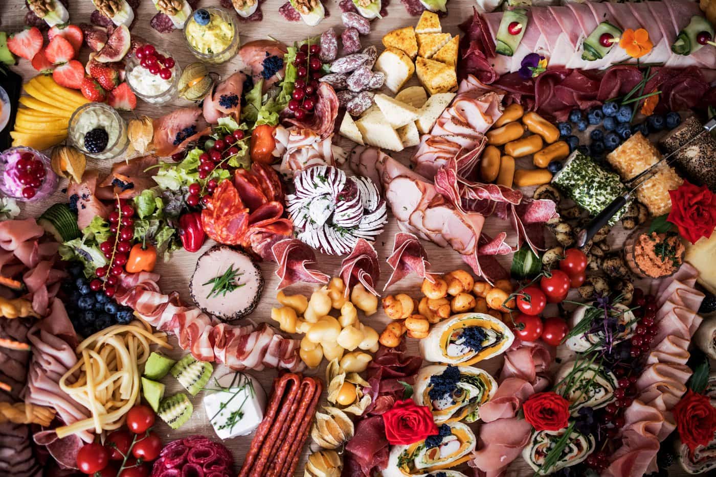 Food snacks and deli meats on a party buffet
