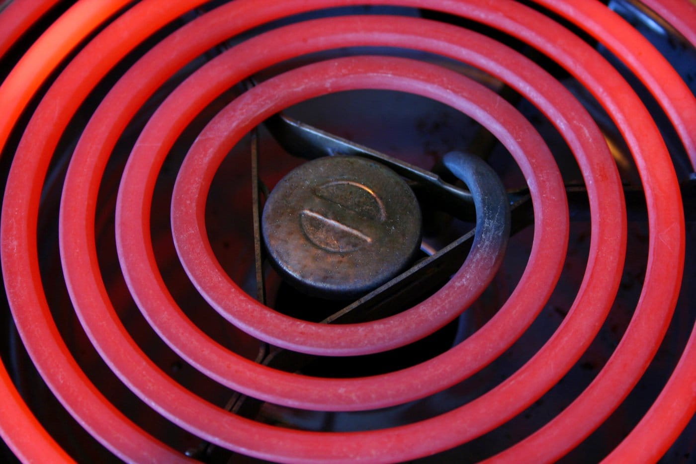Red hot electric stove coil can burn
